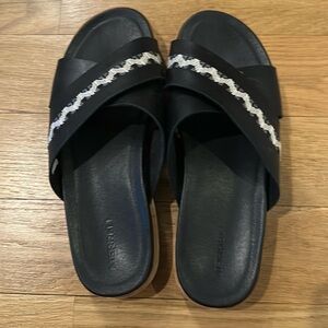 Merrell black leather slip on sandals